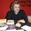 Nicolas Rey lors de la 33e edition du Salon du Livre, à Paris, le 22 mars 2013.