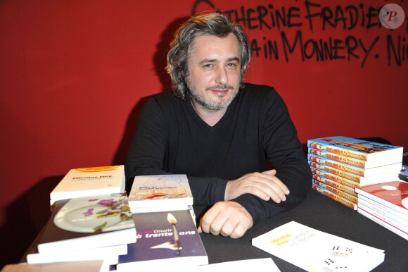 Nicolas Rey lors de la 33e edition du Salon du Livre, à Paris, le 22 mars 2013.
