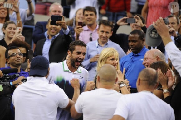 Marin Cilic fête sa victoire à l'US Open à New York le 8 septembre 2014. 