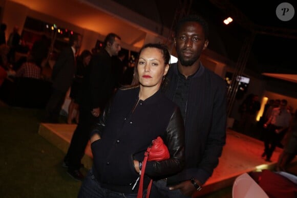 Thomas Ngijol et sa femme Karole Rocher lors des 20 ans de la société Orange à L'Electric, à Paris le 9 septembre 2014
