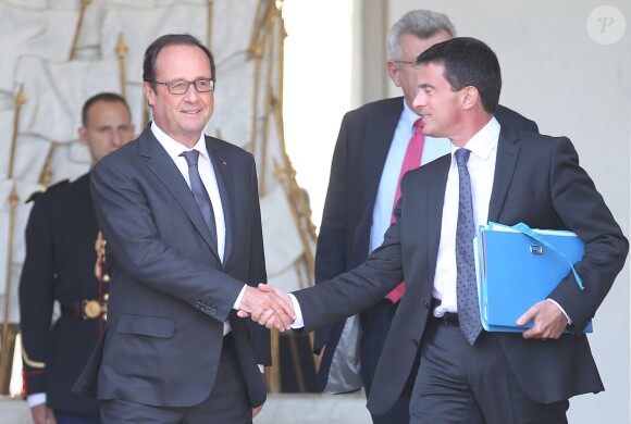 François Hollande, Manuel Valls - Sortie du conseil des ministres au palais de l'Elyée à Paris le 10 septembre 2014. 