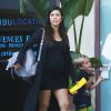 Exclusif - Kourtney Kardashian, enceinte et chic en petite robe noire, avec son fils Mason. Malibu, le 11 septembre 2014.