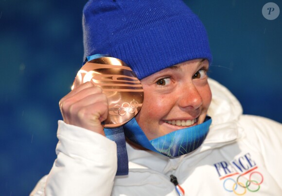 Marie Dorin et sa médaille de bronze décrochée sur le 7,5 km sprint aux JO de Vancouver le 13 février 2010
