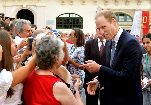 The Duke of Cambridge meets well wishers during a walkabout in Valletta, Malta, ahead of the 50th anniversary of its independence, in Valetta, Malta on Saturday September 20, 2014. William was a last minute replacement for pregnant wife Kate, forced to withdraw with severe morning sickness, but he was warmly welcomed by Maltese President Marie-Louise Coleiro Preca. See PA story ROYAL Malta. Photo by John Stillwell/PA Wire/ABACAPRESS.COM20/09/2014 - Valletta