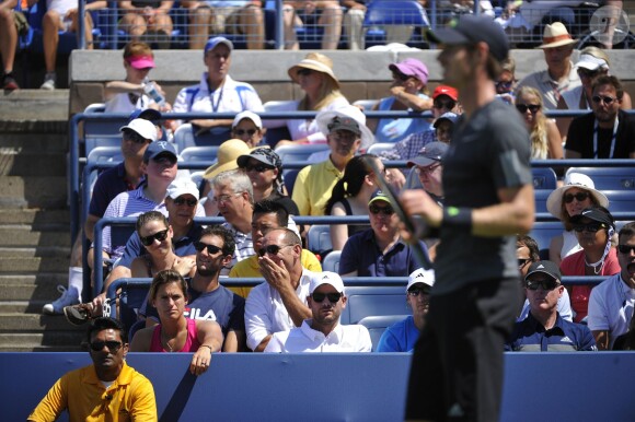 Andy Murray lors de son premier tour de l'US Open sous les yeux d'Amélie Mauresmo, à Flushing Meadows à New York le 25 août 2014