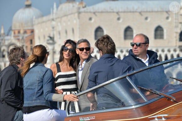 George Clooney et sa fiancée Amal Alamuddin arrivent à Venise le 26 septembre 2014 où ils vont célébrer leur mariage civil, prévu lundi 29 septembre.