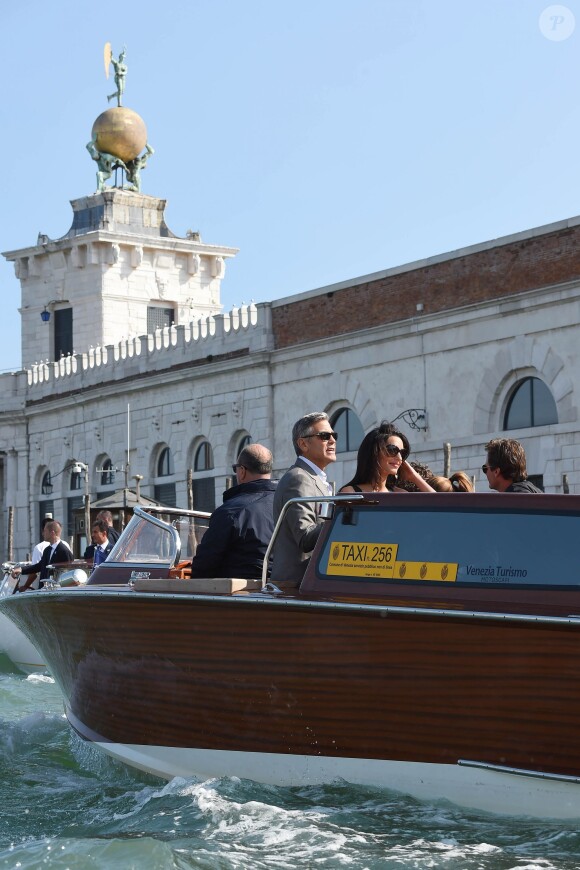George Clooney and his girlfriend Amal Alamuddin alongg with their friends Cindy Crawford and Rande Gerber arrive in Venice, Italy, September 26, 2014. The civil wedding is expected to take place in a 14th century palace, owned by the Venice council, almost in front of the Aman resort. Photo by PictureVideoStore/ABACAPRESS.COM26/09/2014 - Venice