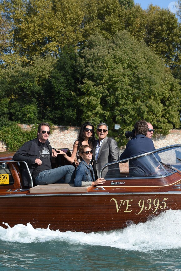 George Clooney et sa future femme Amal Alamuddin arrivent avec leurs amis Cindy Crawford et Rande Gerber pour le mariage à Venise le 26 septembre 2014