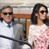 George Clooney et sa femme Amal Alamuddin (en robe Giambattista Valli Couture) apparaissent pour la première fois après leur mariage, le 28 septembre 2014, quittant l'Aman Grande Canal Venice après leur nuit de noces pour rallier le Cipriani pour un brunch avec leurs proches.
