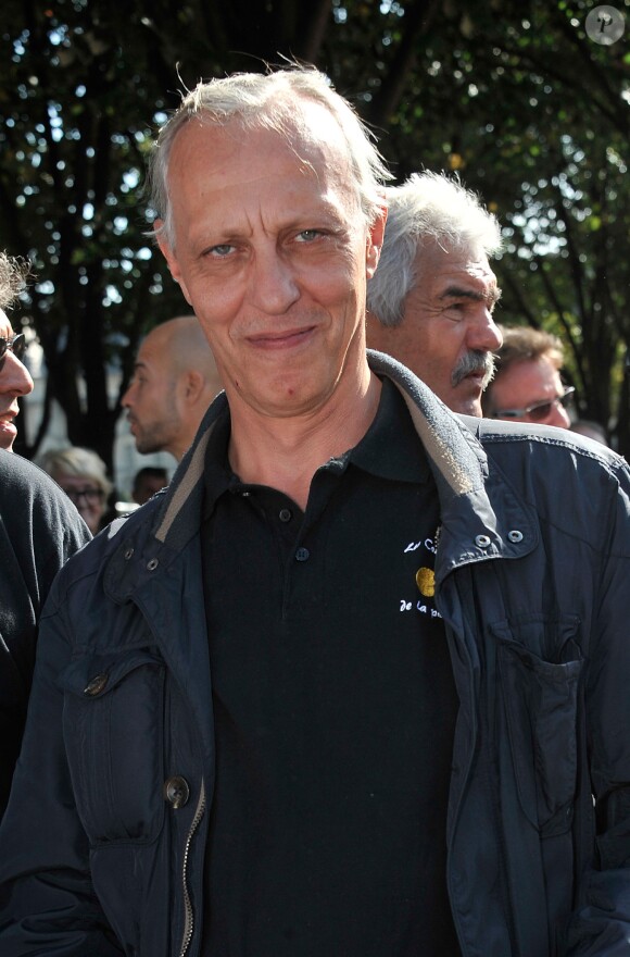 Tom Novembre lors du 2e tournoi de pétanque au profit de l'association "MeghanOra" sur l'Esplanade des Invalides à Paris, le 28 septembre 2014