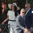 George Clooney et sa femme Amal Alamuddin (en Stella McQueen) quittant l'h&ocirc;tel Cipriani pour se rendre au palais de Ca Farsetti &agrave; Venise, le 29 septembre 2014 pour leur mariage civil &agrave; la mairie de Venise qui va officialiser la c&eacute;r&eacute;monie de samedi soir. 