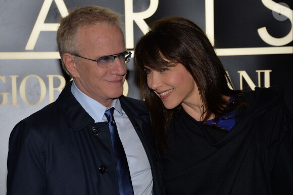Sophie Marceau et son compagnon Christophe Lambert à Paris, le 21 janvier 2014.
