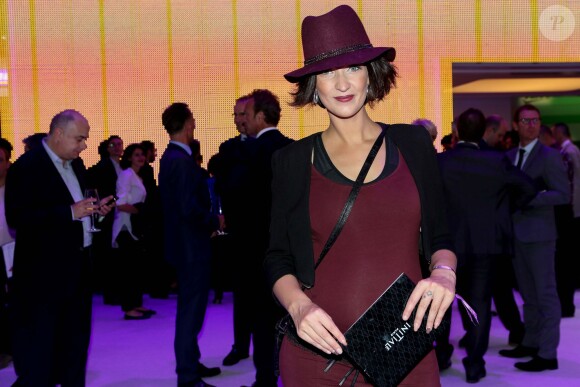 Sheryfa Luna (enceinte) lors de la soirée d'inauguration des nouvelles Renault Espace et Clio lors du Salon de l'automobile au Parc des Expositions de la porte de Versailles à Paris, le 2 octobre 2014.