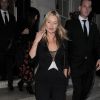 Kate Moss lance la nouvelle coupe de champagne d'inspiration Art déco, moulée d'après son sein gauche, lors d'un déjeuner dans le célèbre restaurant 34 à Londres, le 8 octobre 2014.