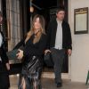 Noel Gallagher et sa femme Sarah MacDonald  assiste au lancement de la nouvelle coupe de champagne d'inspiration Art déco, moulée d'après le sein de Kate Moss, au restaurant 34 à Londres, le 8 octobre 2014. 
