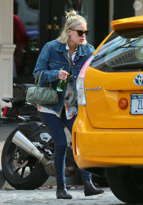 Tallulah Willis cherche un taxi à New York, le 19 septembre 2014.