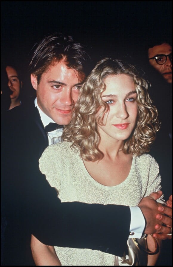 <p>Robert Downey Jr et Sarah Jessica Parker, lors d'une soirée en 1991</p>
