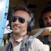 Sébastien Valiela en hélicoptère, toujours "armé" de son appareil photo