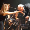 Vladimir Cosma en concert symphonique au Grand Rex, à Paris, le 23 mars 2013 avec Anne Gravoin, femme de Manuel Valls, comme premier violon.