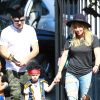 Hilary Duff et son mari Mike Comrie emmènent leur fils Luca à une fête d'Halloween à Los Angeles, le 18 octobre 2014.