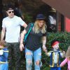 Hilary Duff et son mari Mike Comrie emmènent leur adorable fils Luca à une fête d'Halloween à Los Angeles, le 18 octobre 2014.