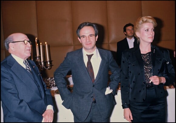 Marcel Dassault, Catherine Deneuve et François Truffaut lors de l'avant-première du film Le Dernier Métro à Paris en 1980