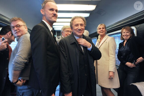 Dominique Besnehard et Michel Drucker - Michel Drucker célèbre ses 50 ans de télévision entouré de ses amis à l'occasion du passage du 'Train De La Télé' en gare de Caen, sa région natale, le 21 octobre 2014.