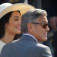 George Clooney et sa femme Amal Alamuddin quittent Venise, le 29 septembre 2014 après leur mariage.