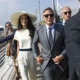 George Clooney et sa femme Amal Alamuddin quittent Venise, le 29 septembre 2014 après leur mariage.