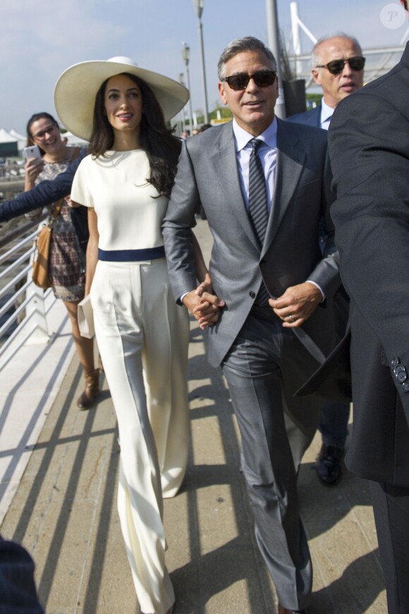 George Clooney et sa femme Amal Alamuddin quittent Venise, le 29 septembre 2014 après leur mariage.