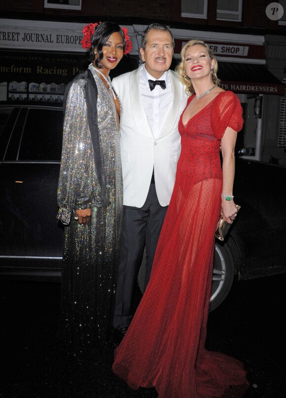 Naomi Campbell et Kate Moss fêtent les 60 ans de leur ami Mario Testino à la Chiltern Firehouse. Londres, le 29 octobre 2014.