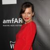Milla Jovovich assiste au gala Inspiration de l'amfAR, aux Milk Studios. Los Angeles, le 29 octobre 2014.