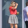 Kate Upton, en shooting pour la marque Express qu'elle représente, a eu droit à une visite du vent sous sa jupe, le 1er novembre 2014 à South Beach, Miami.