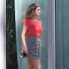 Kate Upton, en shooting pour la marque Express qu'elle représente, a eu droit à une visite du vent sous sa jupe, le 1er novembre 2014 à South Beach, Miami.