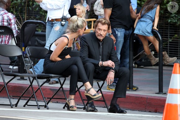 Laeticia Hallyday et Johnny Hallyday sur le tournage de son nouveau clip "Seul" (chanson extraite de son nouvel album "Rester Vivant") à Los Angeles, le 12 octobre 2014.
