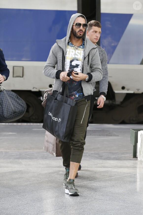 Thomas Vergara, sa mère Sylvia et des amis prennent un TGV à la gare de Lyon à Paris, France le 12 Novembre 2014.
