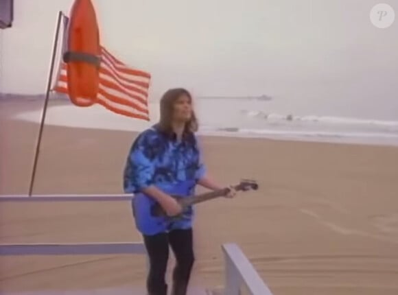 Le rockeur Jimi Jamison dans le clip de "I'm Always Here" pour la série "Alerte à Malibu".