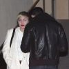 Miley Cyrus et Patrick Schwarzenegger à la sortie du Egyptian Theatre de Los Angeles, le 12 novembre 2014.