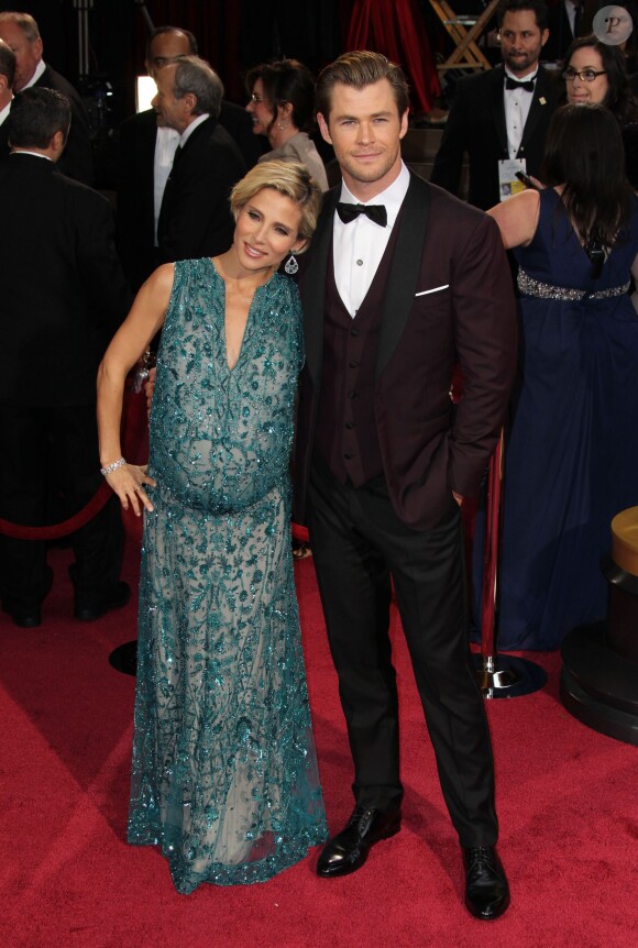 Elsa Pataky (habillée en Elie Saab) enceinte et son mari Chris Hemsworth - 86ème cérémonie des Oscars à Hollywood, le 2 mars 2014.