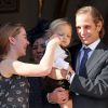 Sacha Casiraghi (1 an et demi), chouchouté par sa tante la princesse Alexandra (15 ans), est apparu dans les bras de son papa Andrea Casiraghi, au balcon du palais princier à Monaco le 19 novembre 2014 pour la Fête nationale.
