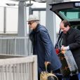  George Clooney avec sa femme Amal &agrave; l'a&eacute;roport d'Heathrow &agrave; Londres en direction des Etats-Unis le 27 novembre 2014 