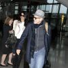 George Clooney et sa femme Amal Alamuddin quittant l'aéroport de Londres le 27 novembre 2014.