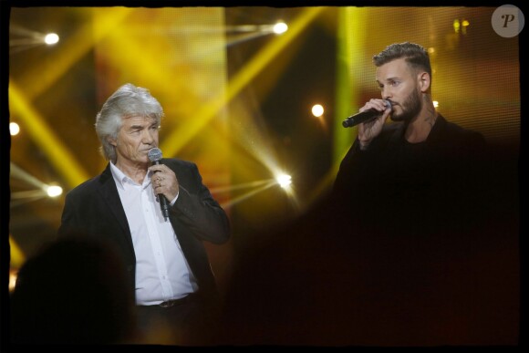 Exclusif - Daniel Guichard et le chanteur M.Pokora (Matt Pokora) interprètent la chanson "Mon Vieux" lors de l'édition 2014 de la "Fête de la chanson française" diffusée sur France 2, enregistrée au Studio TSF à Aubervilliers, le 21 novembre 2014.