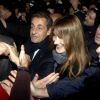 Nicolas Sarkozy et sa femme Carla Bruni-Sarkozy arrivent au QG de campagne après l'annonce de sa victoire à la présidence de l'UMP, vers 21h40 le 29 novembre 2014