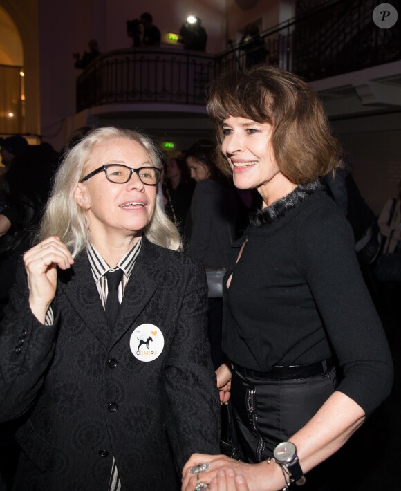 Dominique Issermann et Fanny Ardant à la maison Jean Paul Gaultier pour la présentation du Projet Iccarre à Paris, le 1er décembre 2014, journée mondiale de lutte contre le Sida.