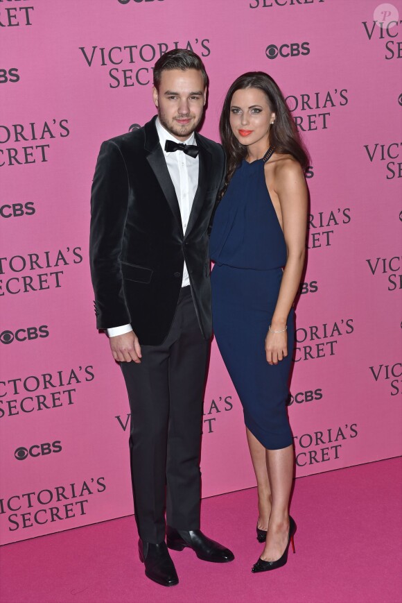 Liam Payne et Sophia Smith assistent au défilé Victoria's Secret 2014 à l'Earls Court Exhibition Centre. Londres, le 2 décembre 2014.
