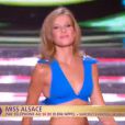  Miss Alsace d&eacute;file en robe de princesse lors de la c&eacute;r&eacute;monie de Miss France 2015 sur TF1, le samedi 6 d&eacute;cembre 2014. 