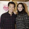 Frédéric Chau et Frédérique Bel à l'opération Smile AMFE. A Paris, le 11 décembre 2014.