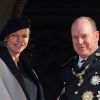 La princesse Charlène (enceinte) (habillée en Akris) et le prince Albert II de Monaco - La famille de Monaco au balcon du palais princier lors de la fête nationale monégasque. Le 19 novembre 2014