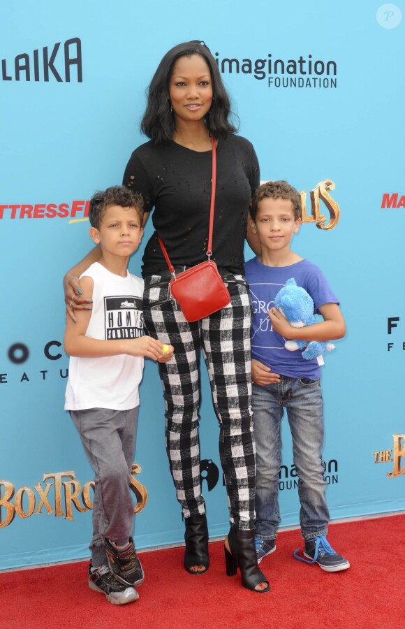 Garcelle Beauvais et ses jumeaux Jax et Jaid à Universal City, Los Angeles, le 21 septembre 2014.